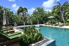 Loungers around the pool at Little Good Harbour, Barbados